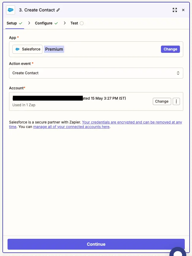 Zapier 中已选择 Salesforce 的 创建联系人 动作,并提示连接账号